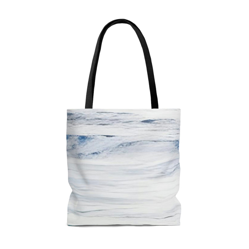Beach life. This stylish and functional Tote Bag is the perfect companion for your day at the beach.