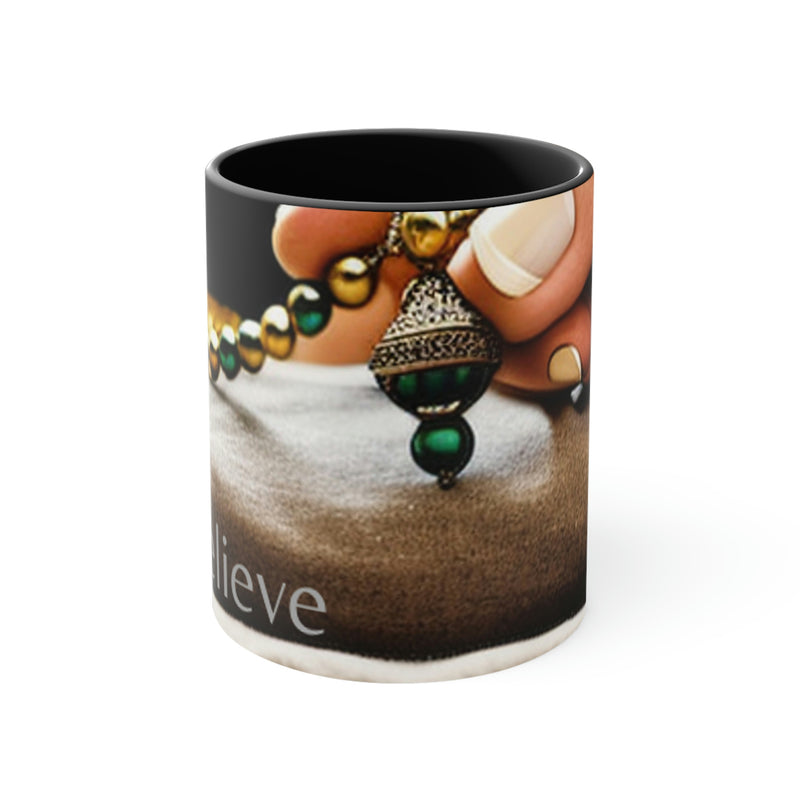 Beautiful coffee mug with the image of a rosary and a bible, with the simple, but powerful word; Believe. From our Faith Based collection of merchandise.