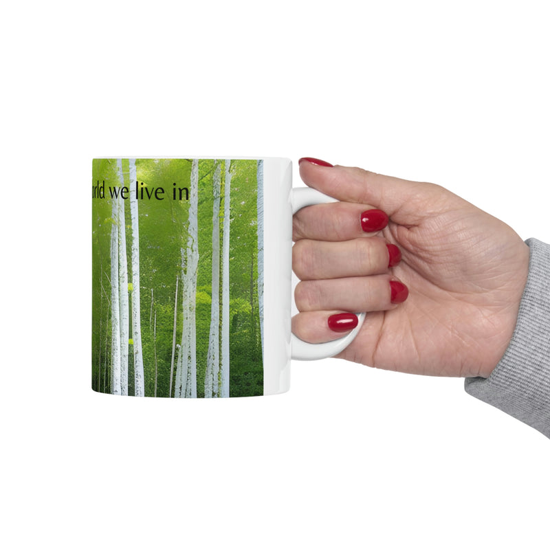 This beautiful coffee mug is part of our Wonderful World collection. Lush greenery surround white Birch trees with the gentle reminder to love the world we live in.