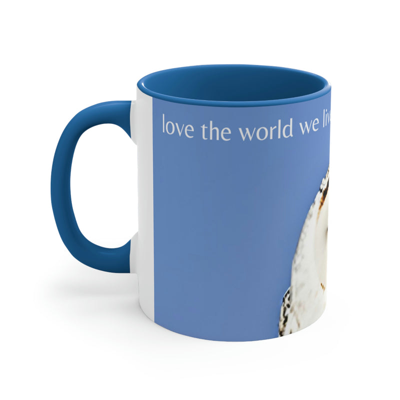 Our Wonderful World series of merchandise that celebrates the world we live in. Beautiful image of a white snow owl with bright blue sky background, and a gentle reminder to love the world we live in.