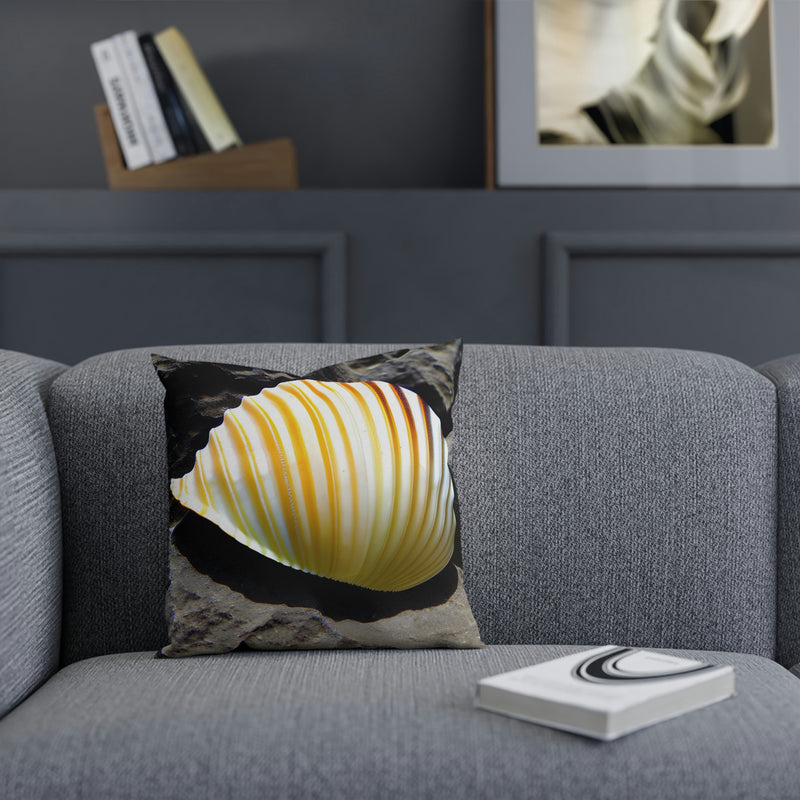 Beautiful accent cushion showing a bright yellow seashell. Perfect addition to any room at your beach house, vacation home, rental property or cabin.